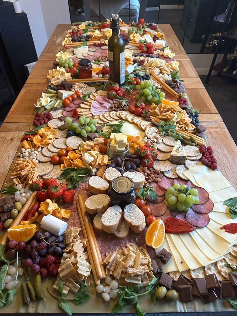 A large cheese board, ready for the guests to tuck into